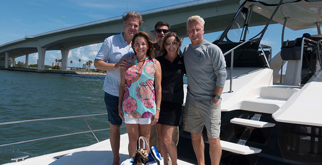 Owners Bruce and Cydne Cooley with friends on their Aquila 48 Power Catamaran