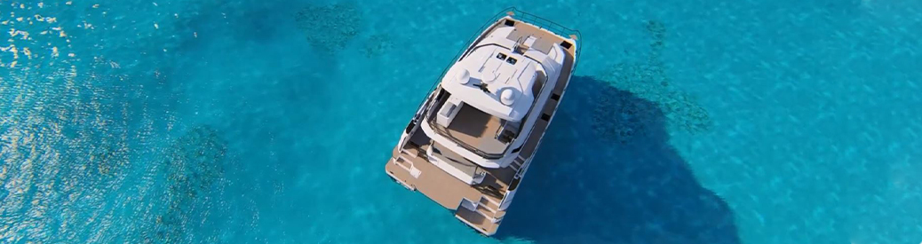 Aerial view of an Aquila 54 power catamaran in the water