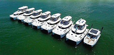 Raft up of eight Aquila boats in the water