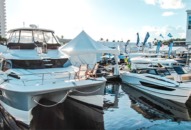 Two Aquila power catamarans docked at the Fort Lauderdale International Boat Show