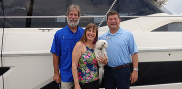 Owners photographed in front of their Aquila, named after their one eyed dog see in the photo