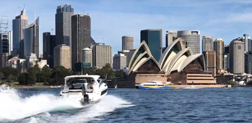 Aquila 36 racing through Sydney Harbour towards the world famous Sydney Opera House